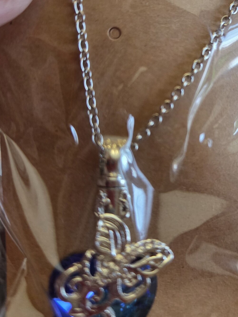 Silver Butterfly Necklace with Blue Heart Pendant
